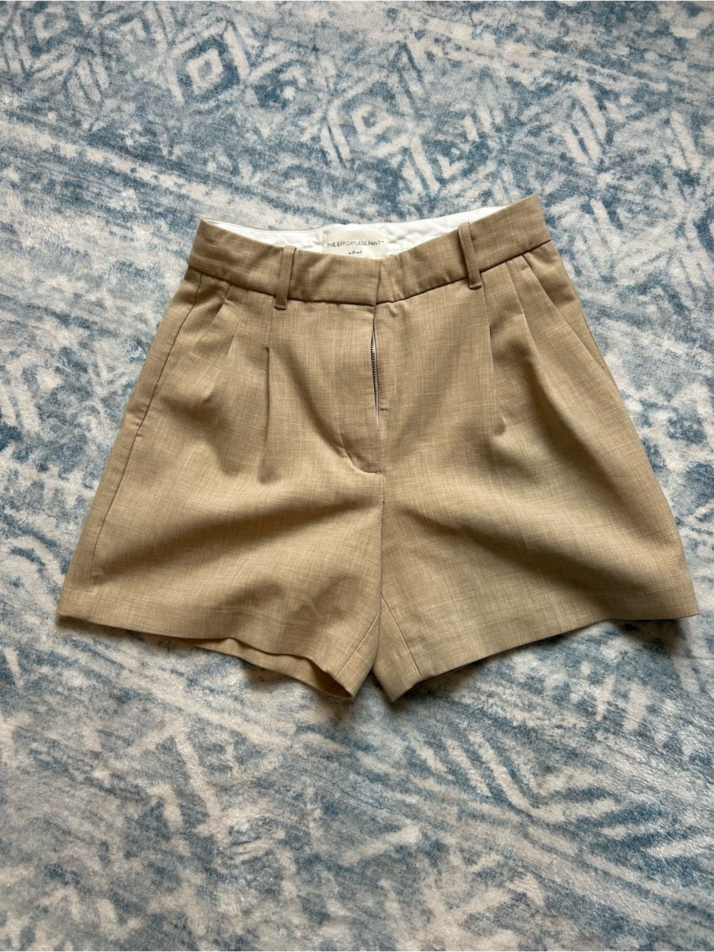 Wilfred Pleated High-Rise Tailored Shorts in Light Beige